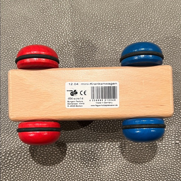 Classic Wooden Toy Ambulance with Red and Blue Wheels - Picture 4 of 4